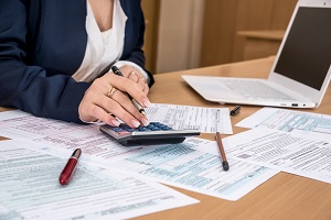 Woman working on tax forms